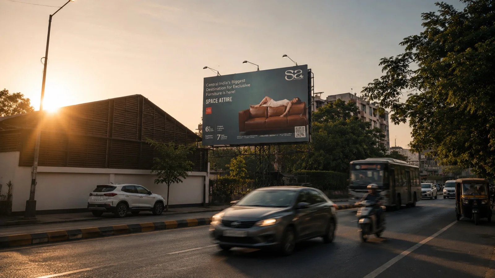 Space Attire launch hoarding on a Nagpur main road at dusk
